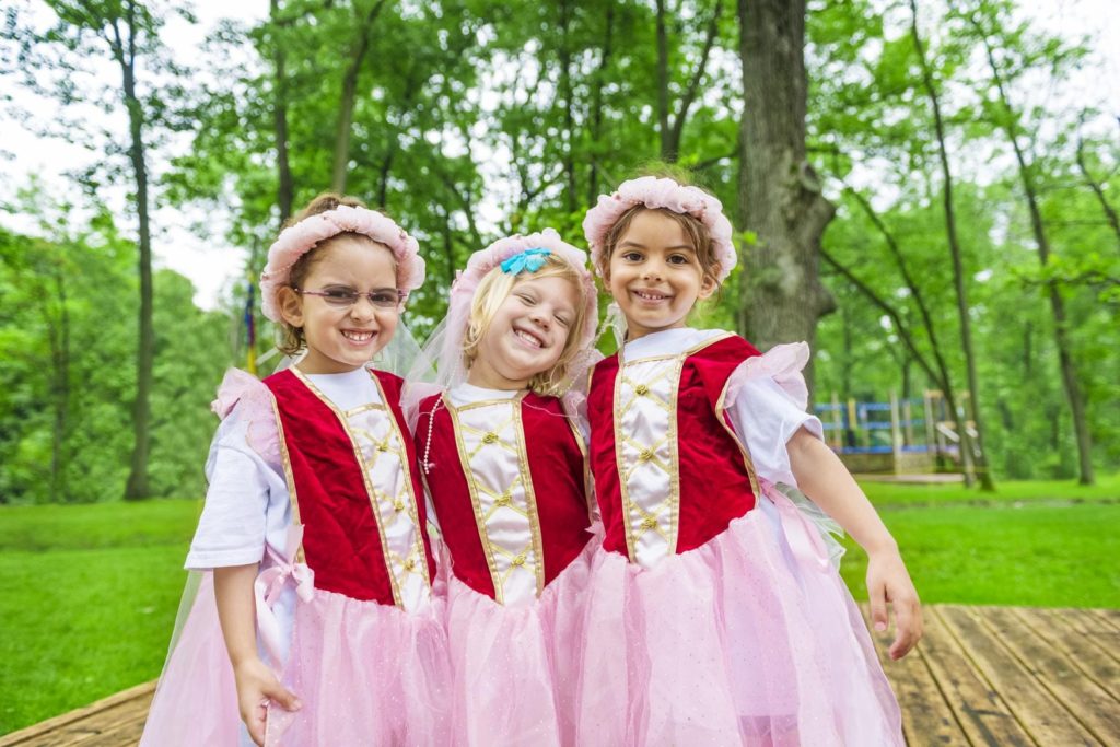 three girls in princess costumes