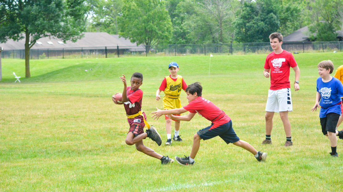 Campers playing flag football