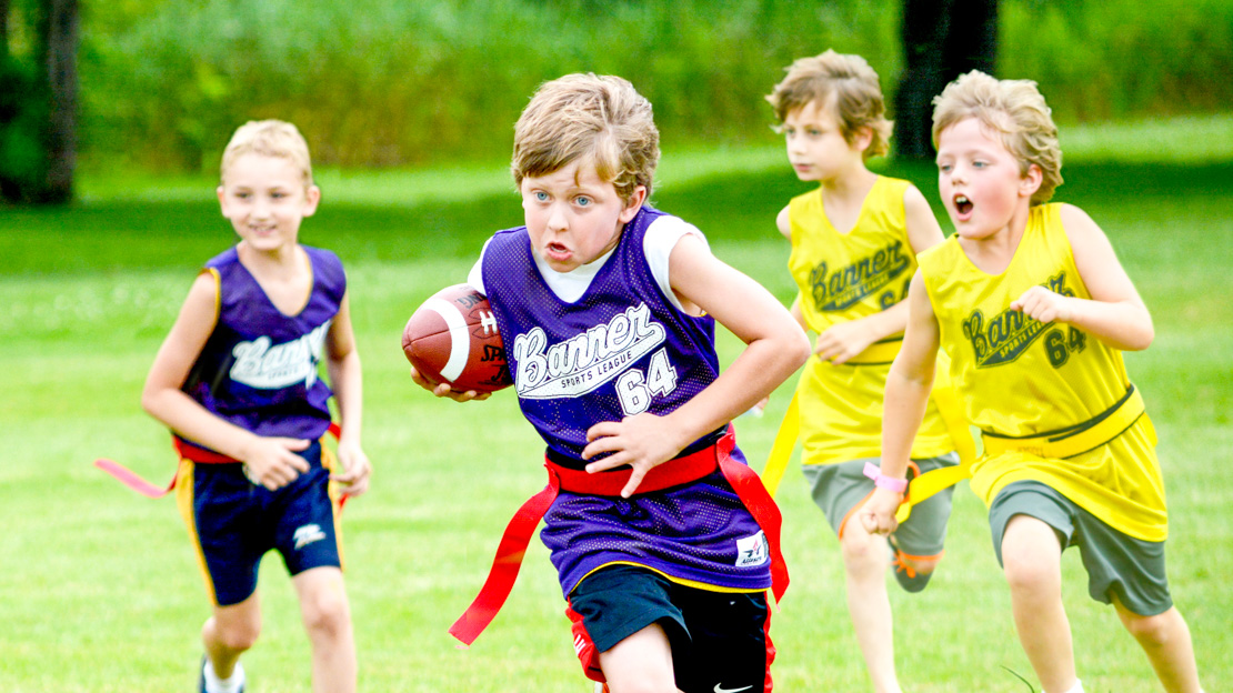 Campers playing flag football