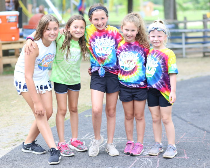 Group of female campers smiling